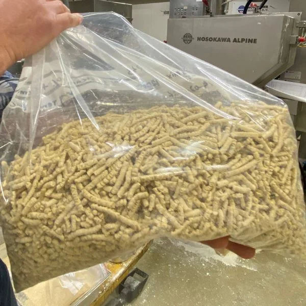 Extruded plant protein products produced from dry-fractionated protein ingredients