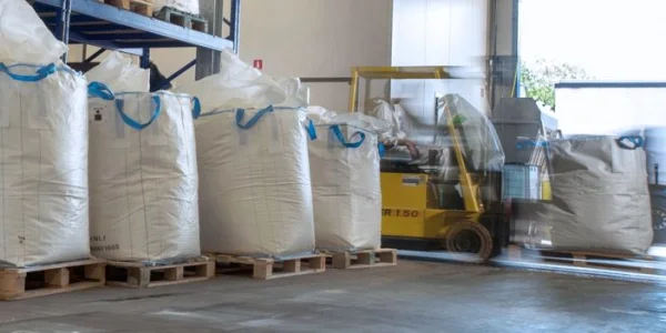 Industrial toll processing of powders and bulk solids